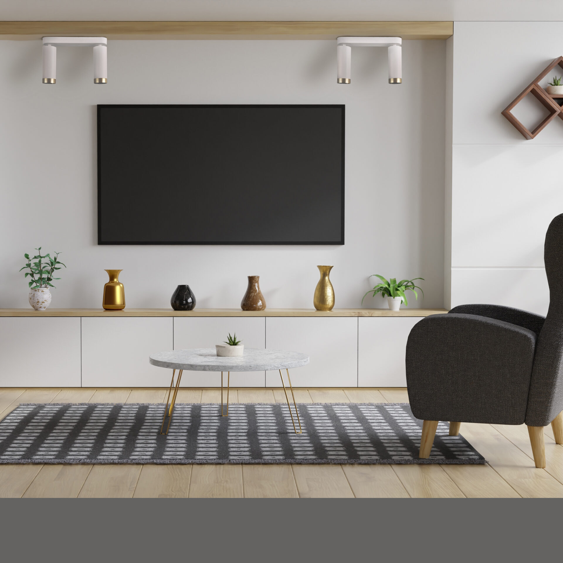 Large TV in the living room on the white wall has a sofa in fron