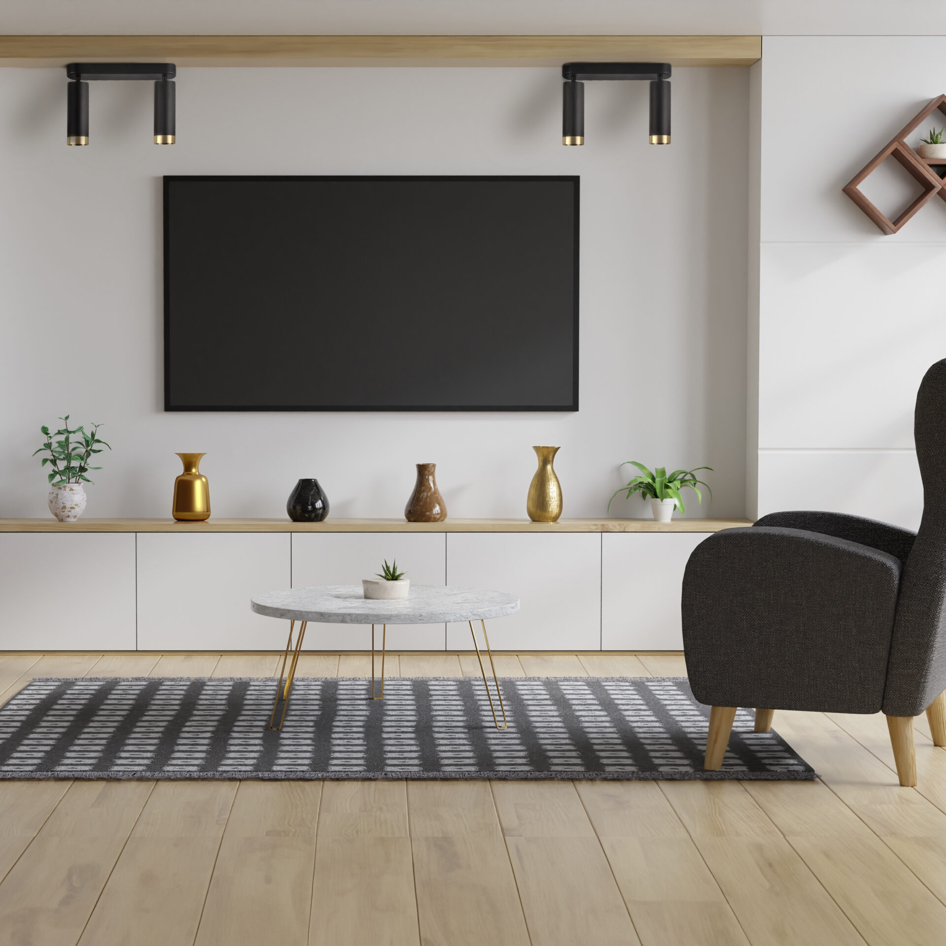 Large TV in the living room on the white wall has a sofa in fron